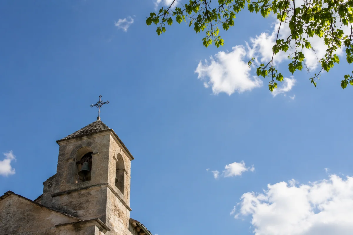 Countryside Church Bell Tower Under Blue Sky
