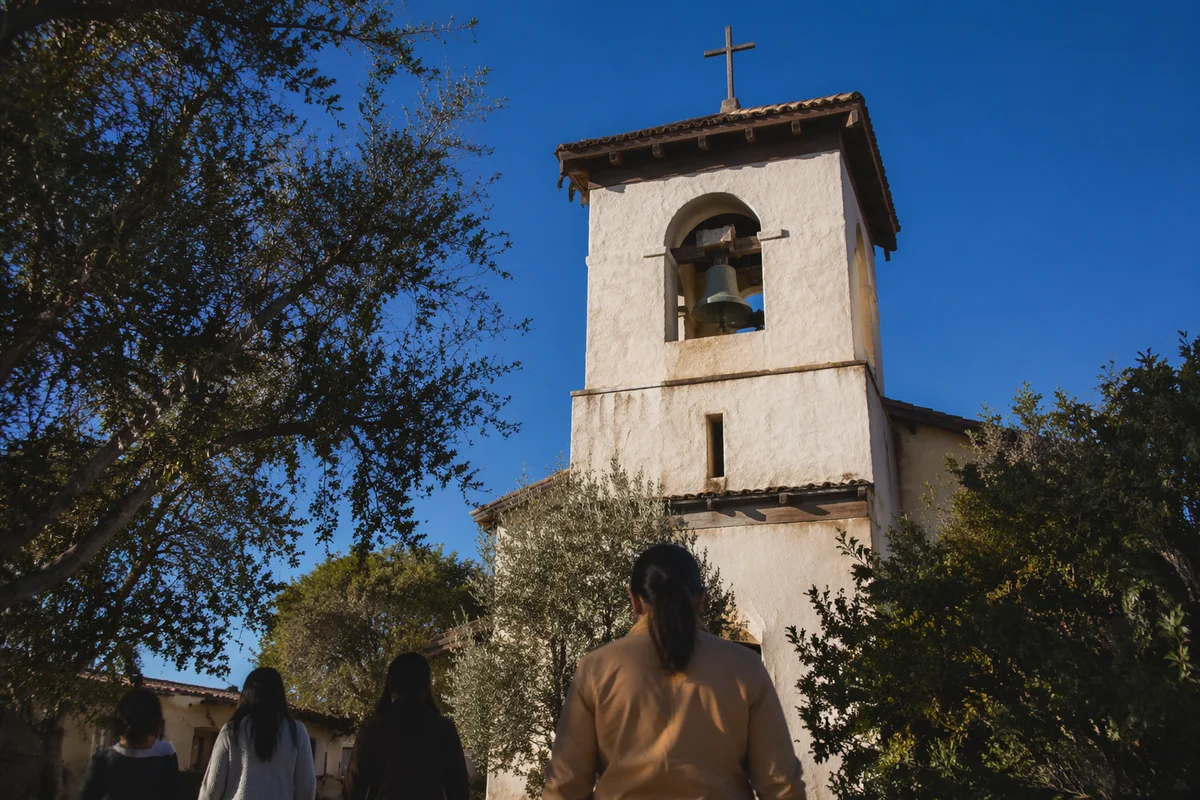 White Church Bell Tower Under Blue Sky