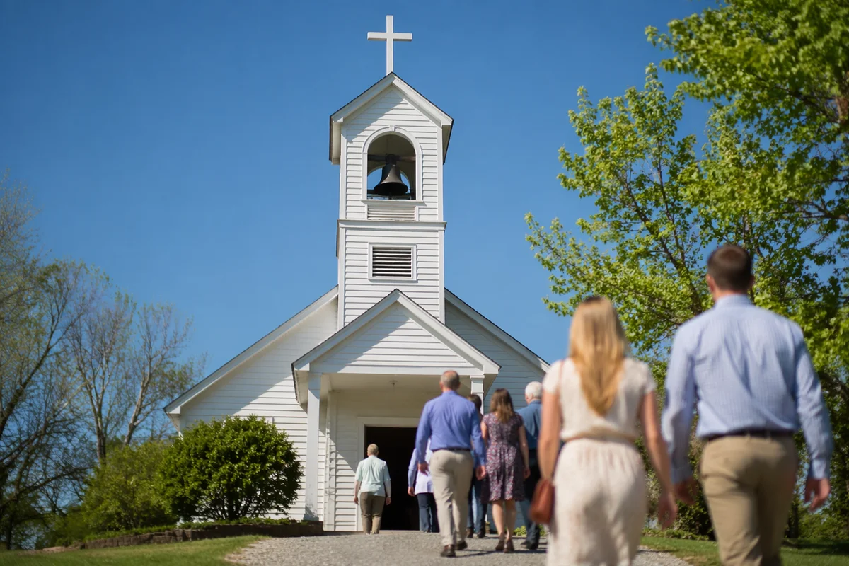 White Church Bell Tower Under Blue Sky