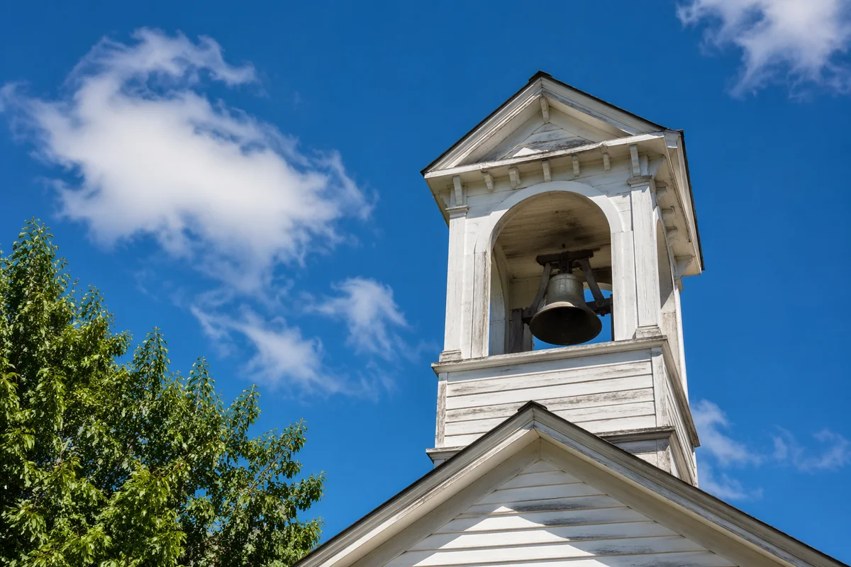 Wooden Church Bell Tower Under Blue Sky