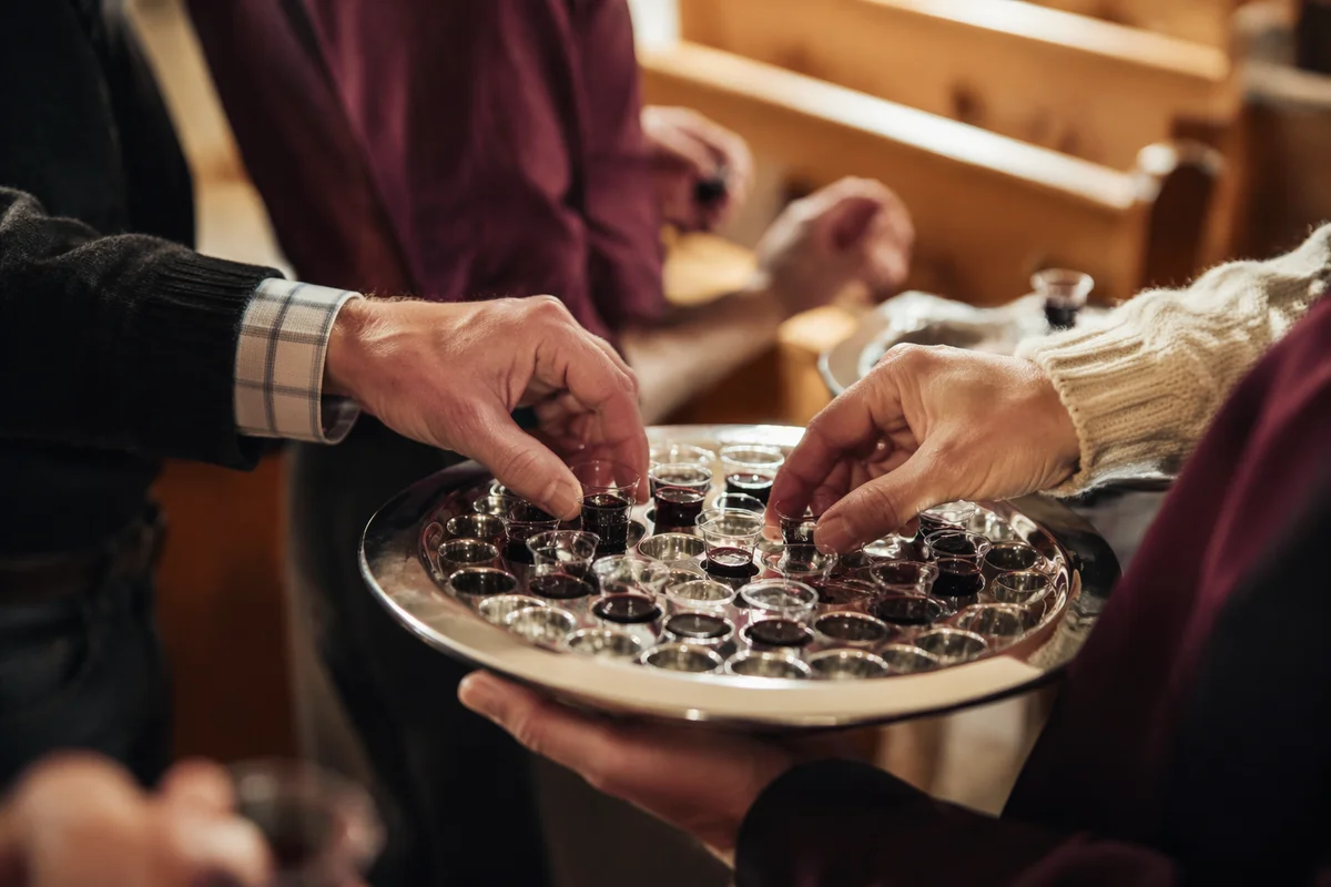 Deacon Serving Communion in Reverent Close-Up