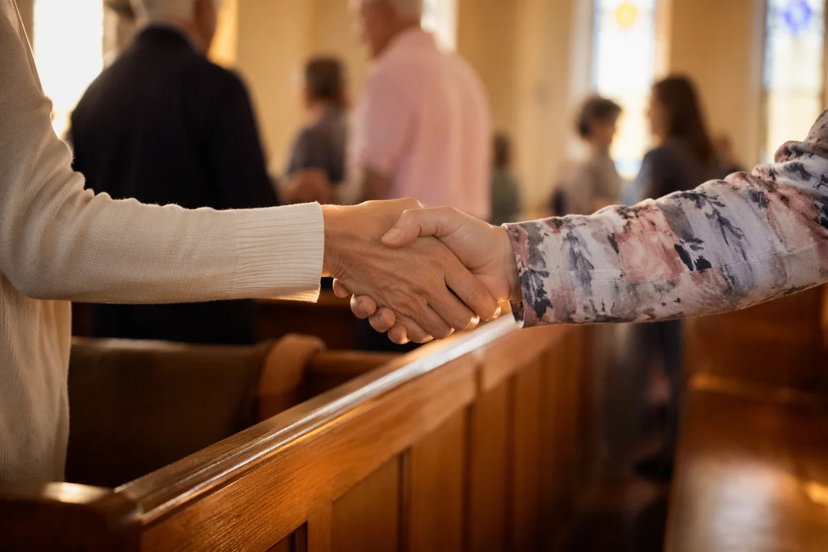 Warm Handshake During Church Greeting of Peace