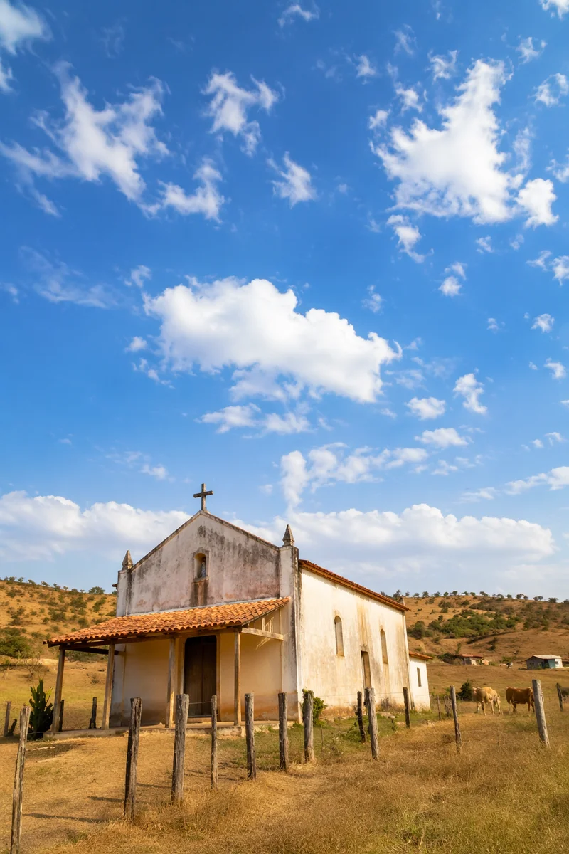 Rural Village Chapel Under Bright Blue Sky