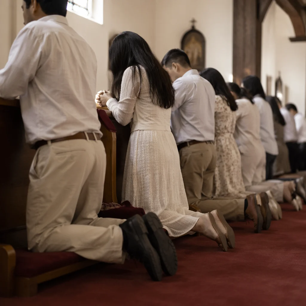 Congregation Kneeling at Communion Rail in Worship