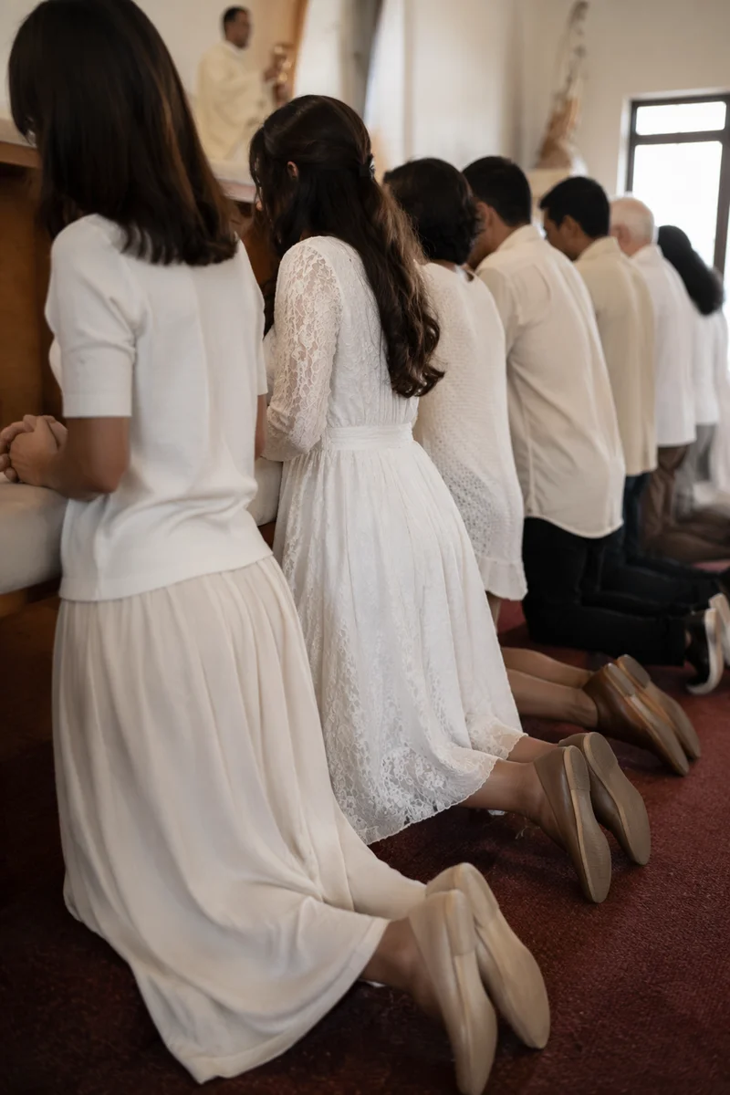 Congregation Kneeling at Communion Rail