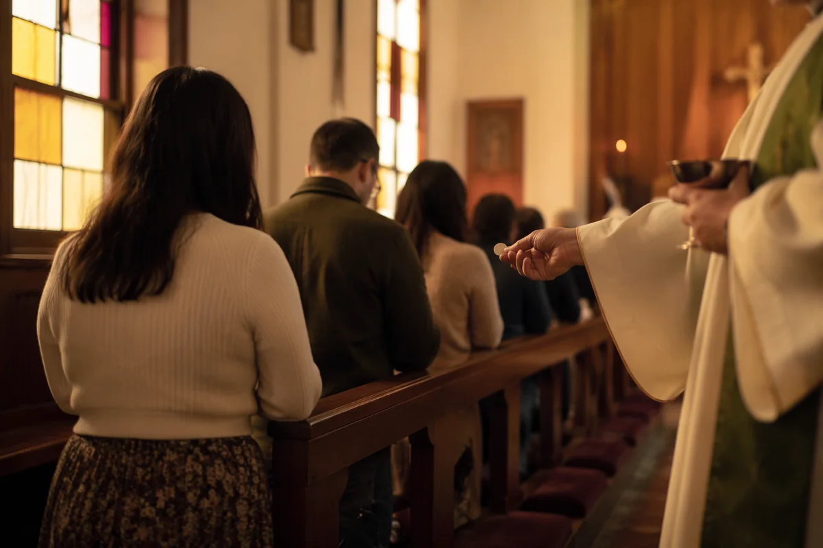 Congregation Kneeling for Communion in Chapel