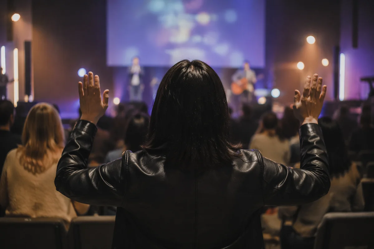 Raised Hands in Contemporary Worship Auditorium