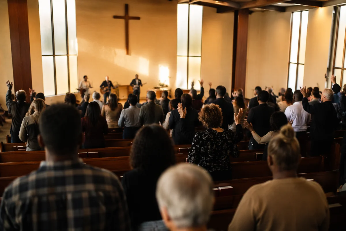 Diverse Congregation Worshiping in Warm Chapel