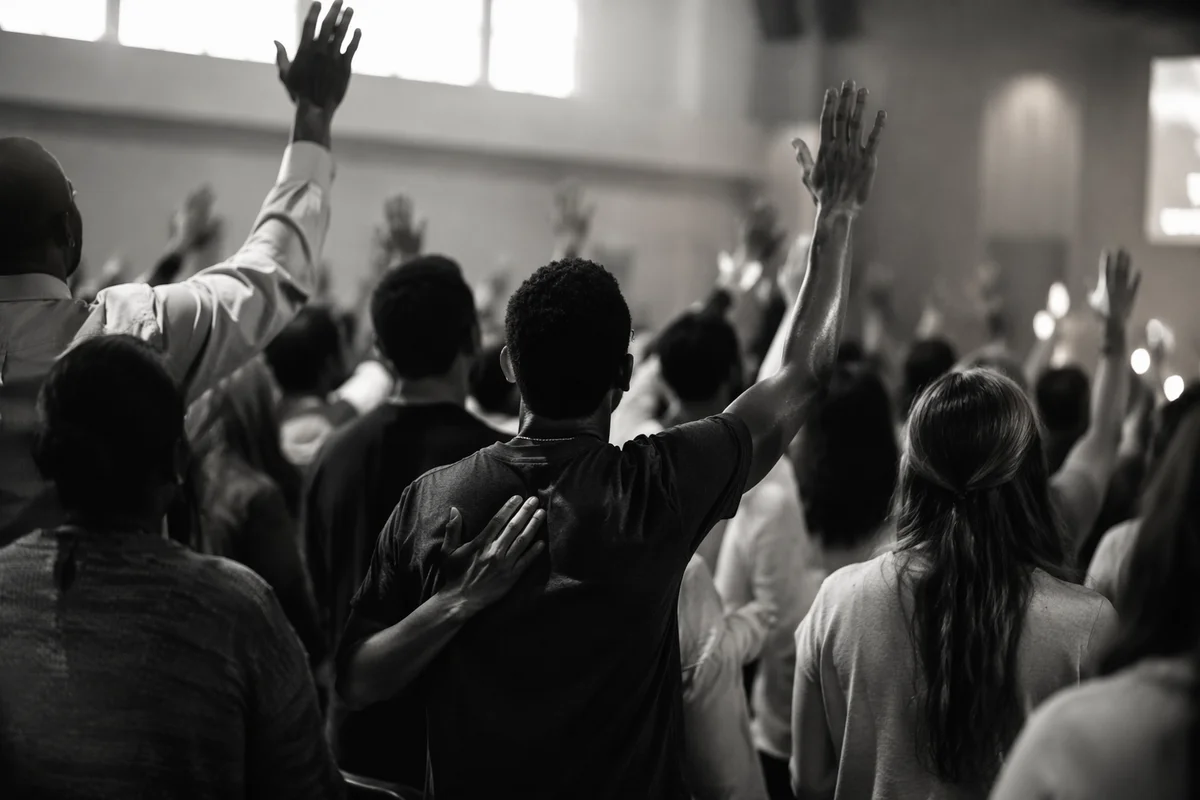 Diverse Congregation Worshiping in Modern Church