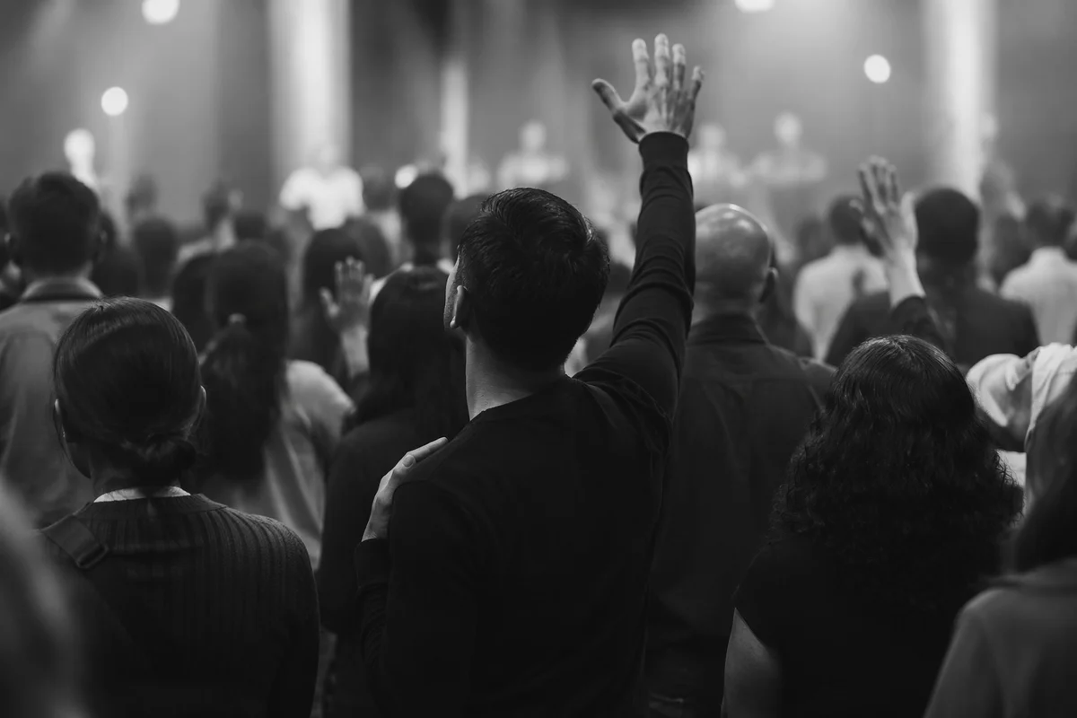 Diverse Congregation Worshiping in Modern Sanctuary