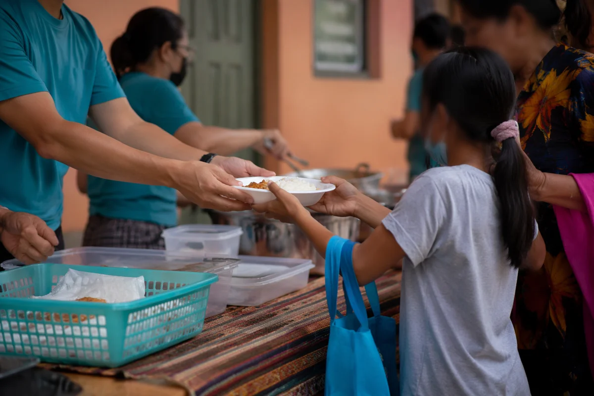Church Outreach Hands Sharing Hot Meals