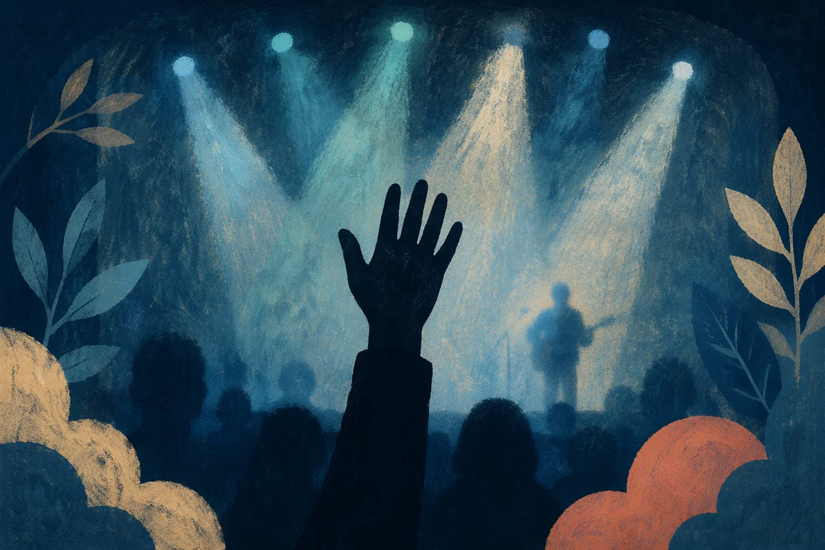 Raised Hand in Worship Concert Lights