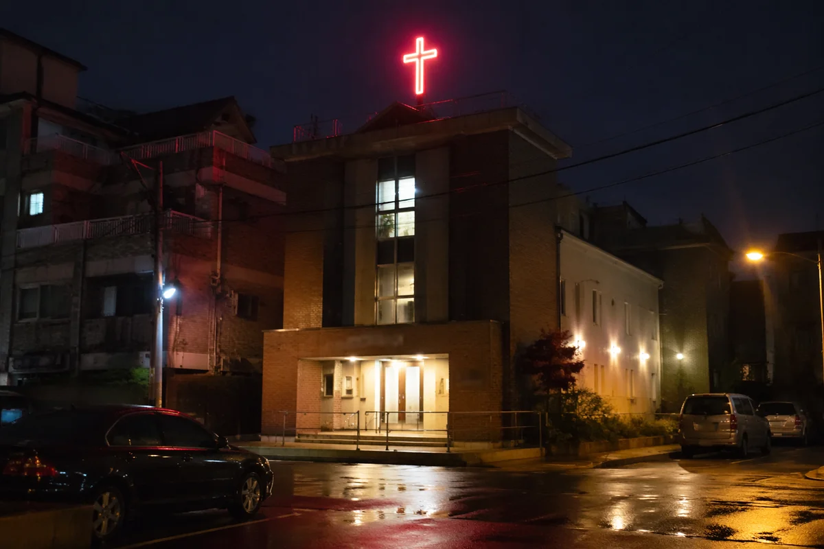 Neon Cross on Korean Church at Night