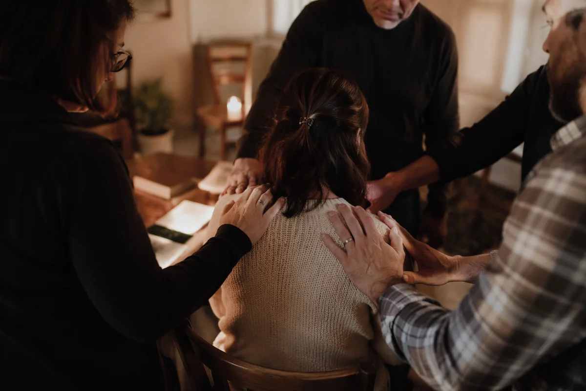 Laying Hands Prayer Ministry in Church Room