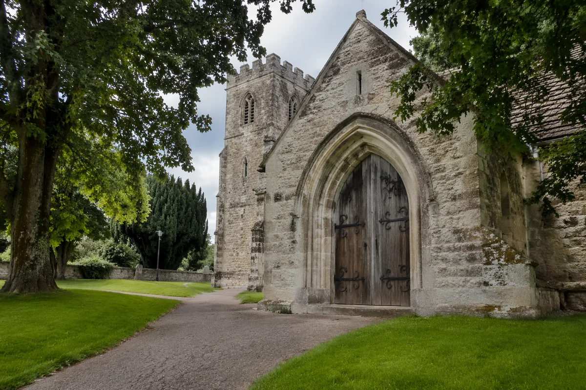 Old Stone Church with Arched Wooden Door