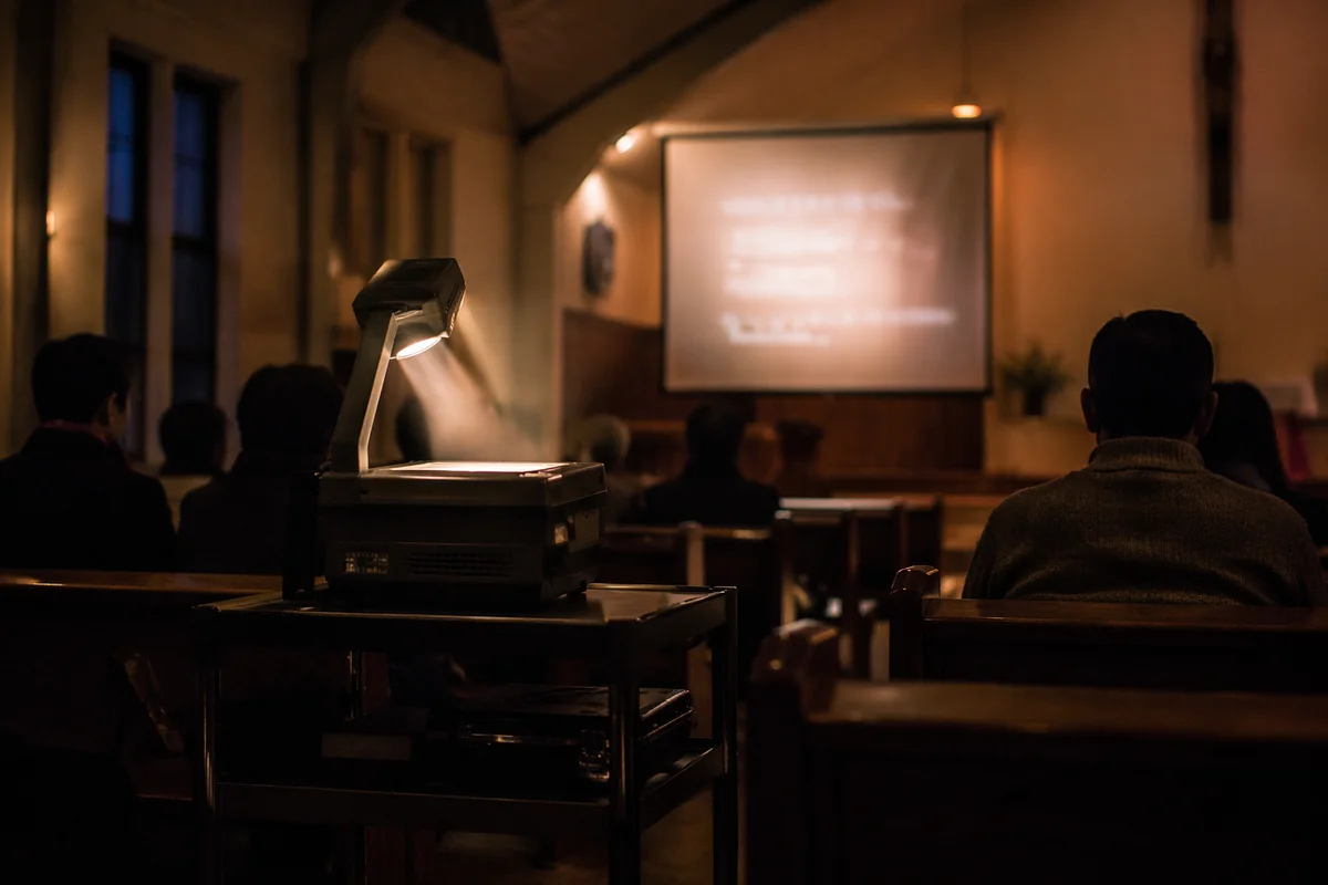 Evening Worship Lyrics Projected in Church Hall