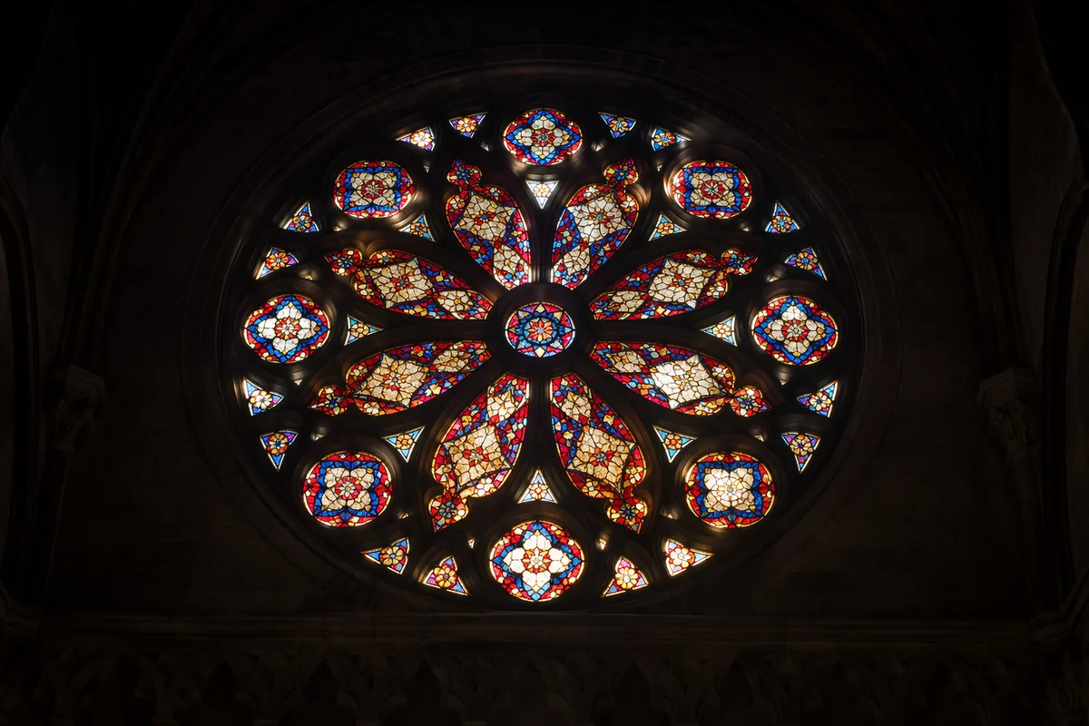 Glowing Rose Window in Quiet Church