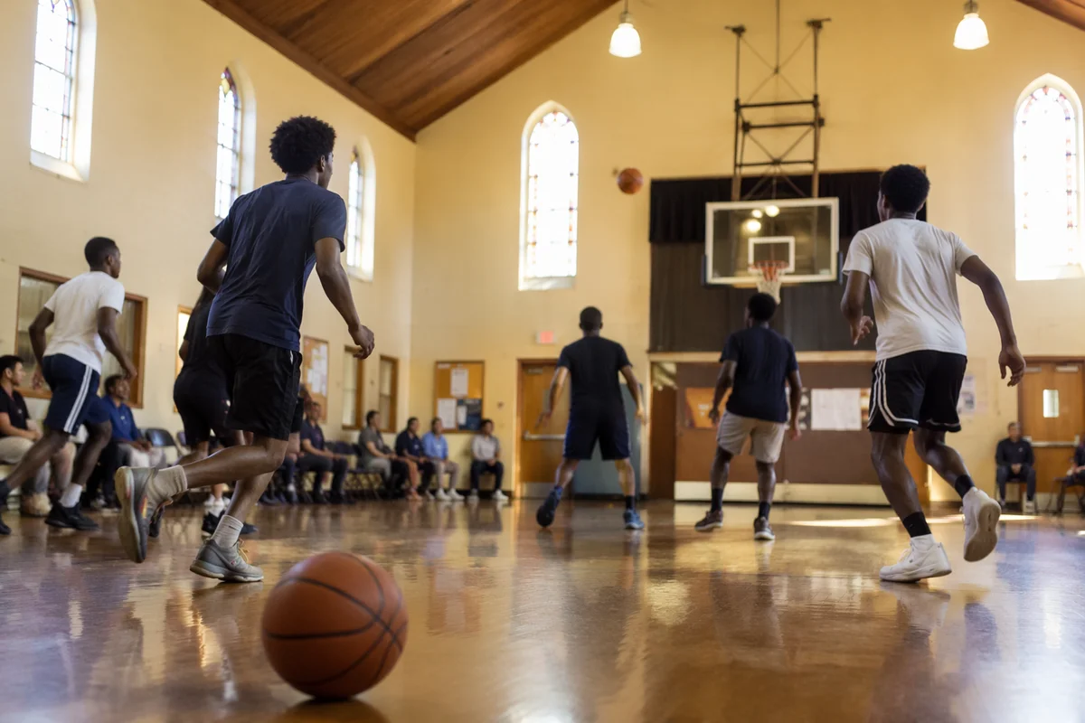 Teen Basketball Game in Church Gym