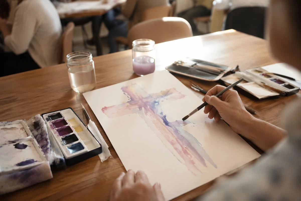 Pastel Watercolor Cross on Church Art Table
