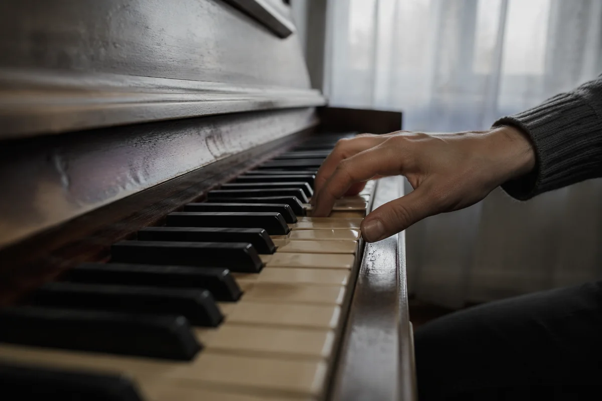 Adult Piano Practice During Quiet Music Lesson