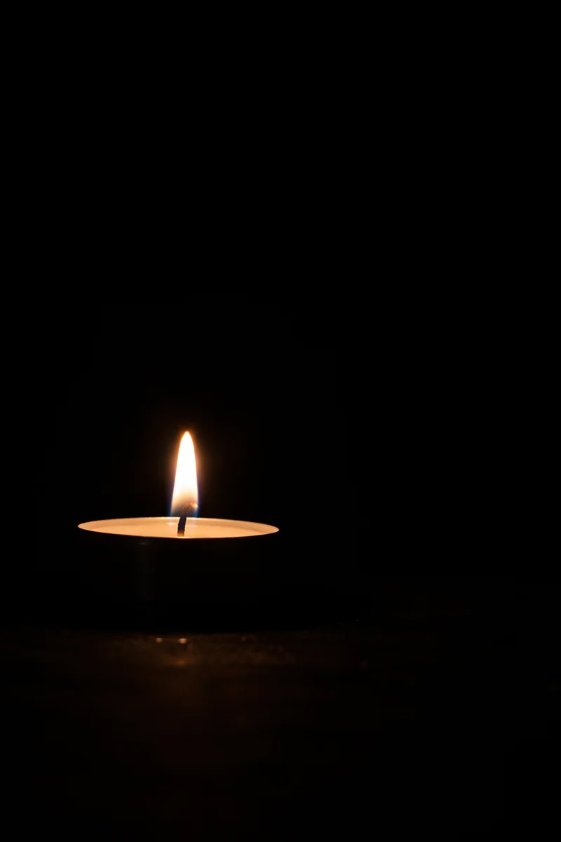 Single Candle of Courage in Darkness