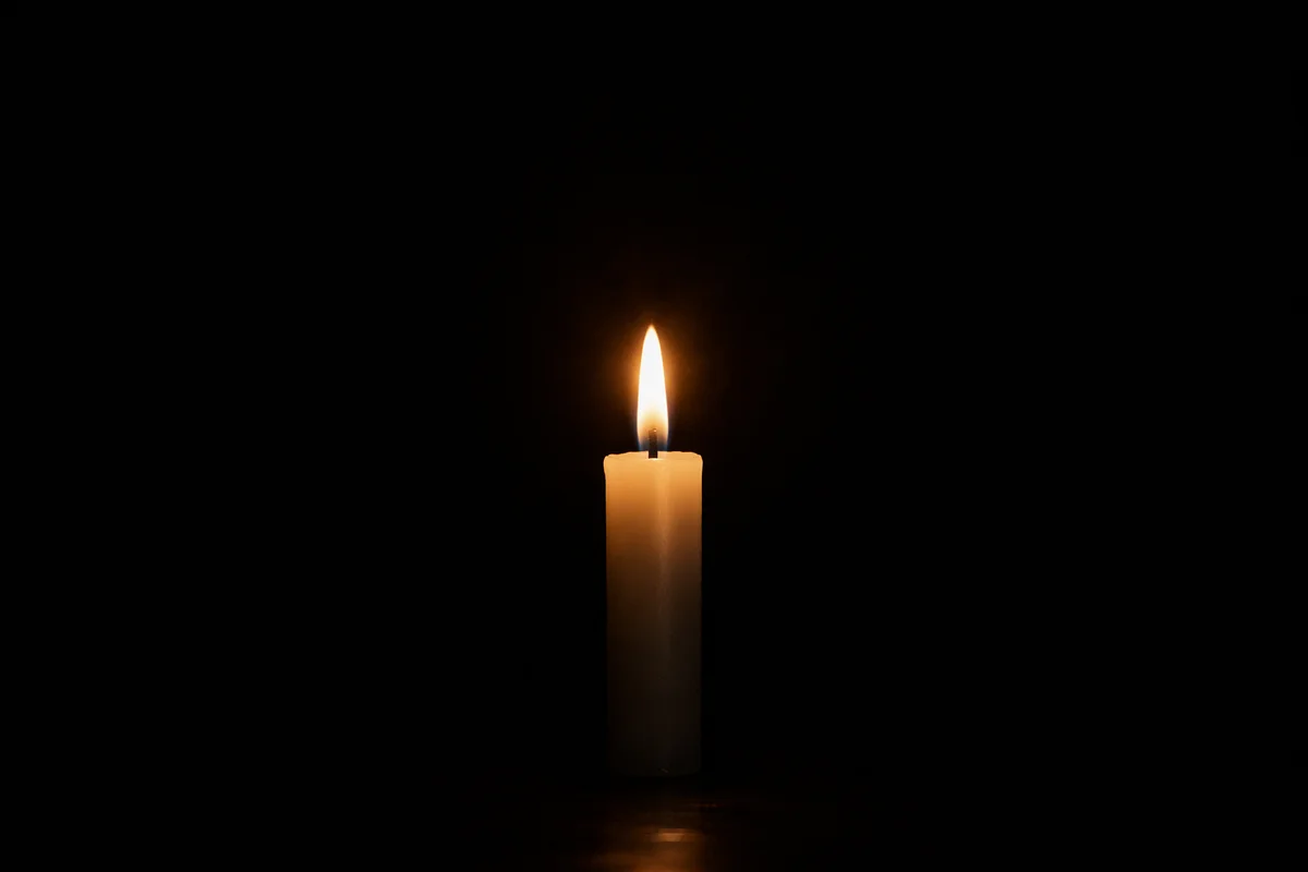 Single Candle of Courage in Darkness