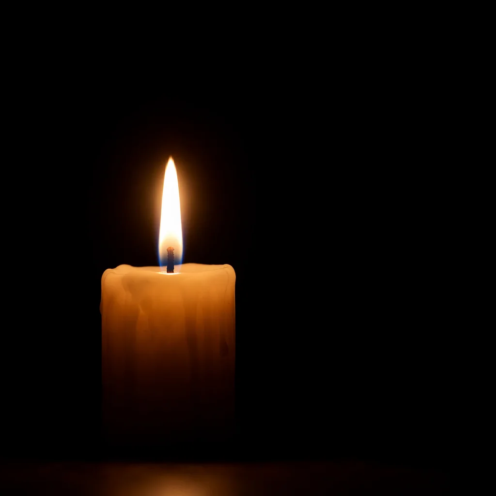 Single Candle of Courage in Darkness