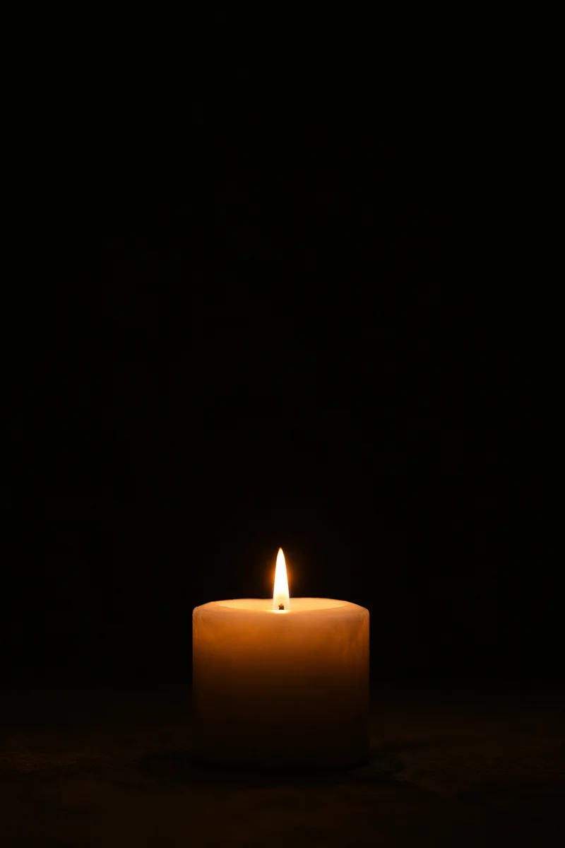 Single Candle of Courage in Darkness