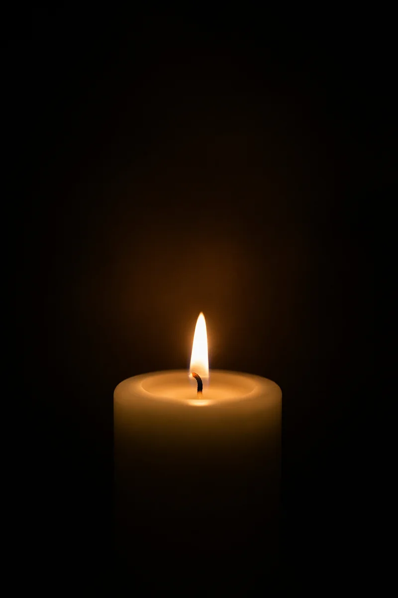 Single Candle of Courage in Darkness