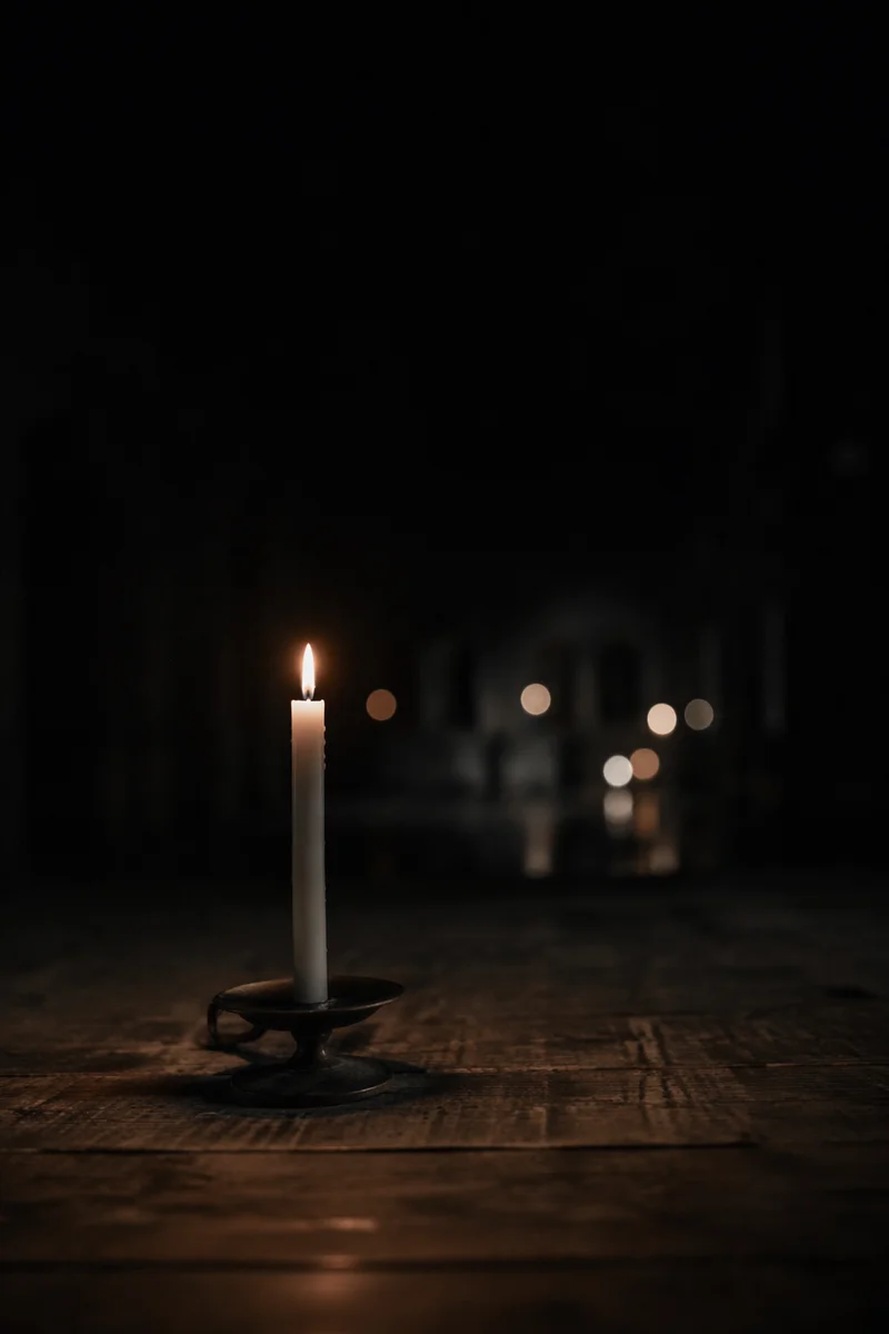 Steady Candle Flame in Vast Darkness