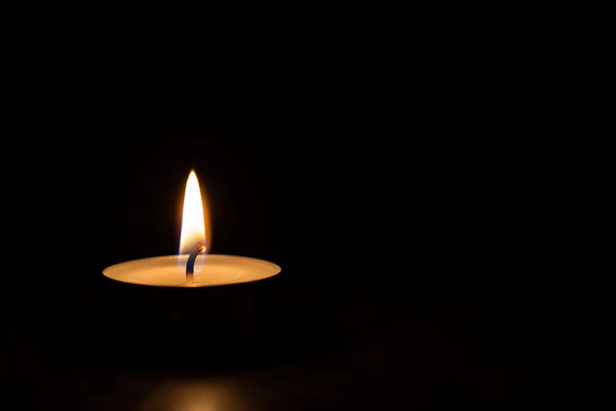 Single Candle of Courage in Darkness