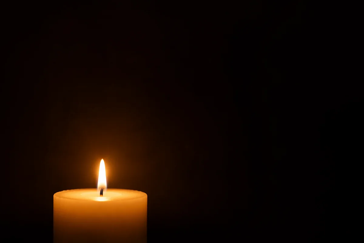 Single Candle of Courage in Darkness
