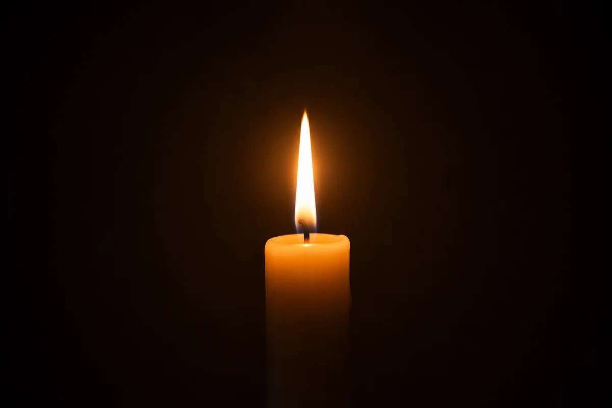 Single Candle of Courage in Darkness