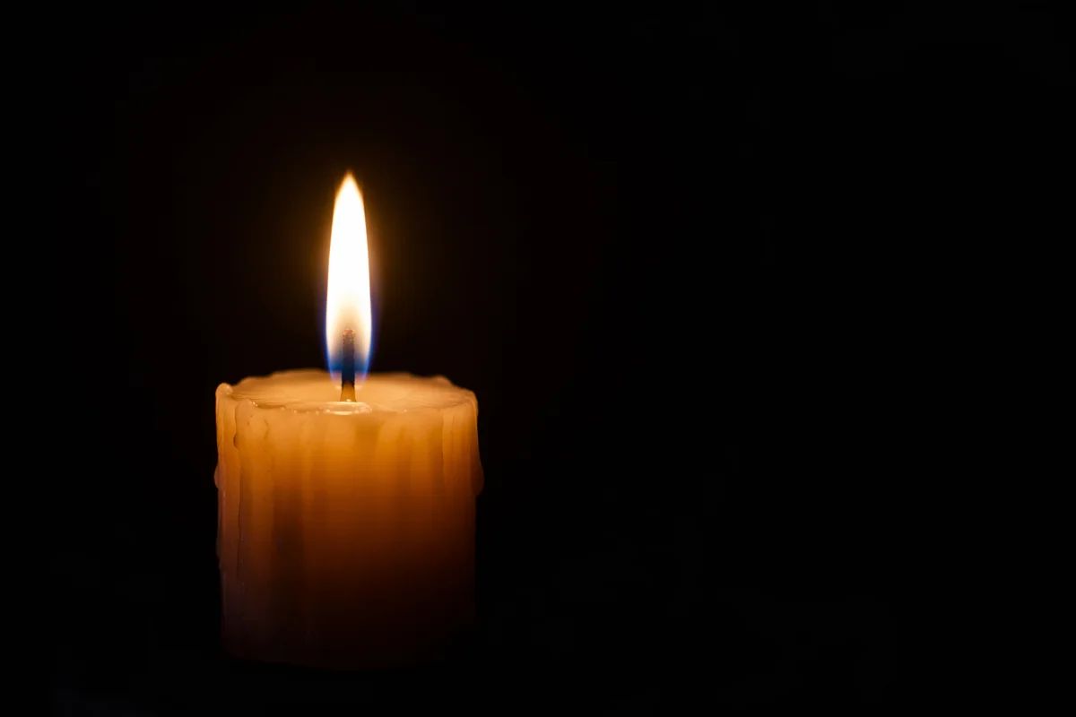 Single Candle of Courage in Darkness