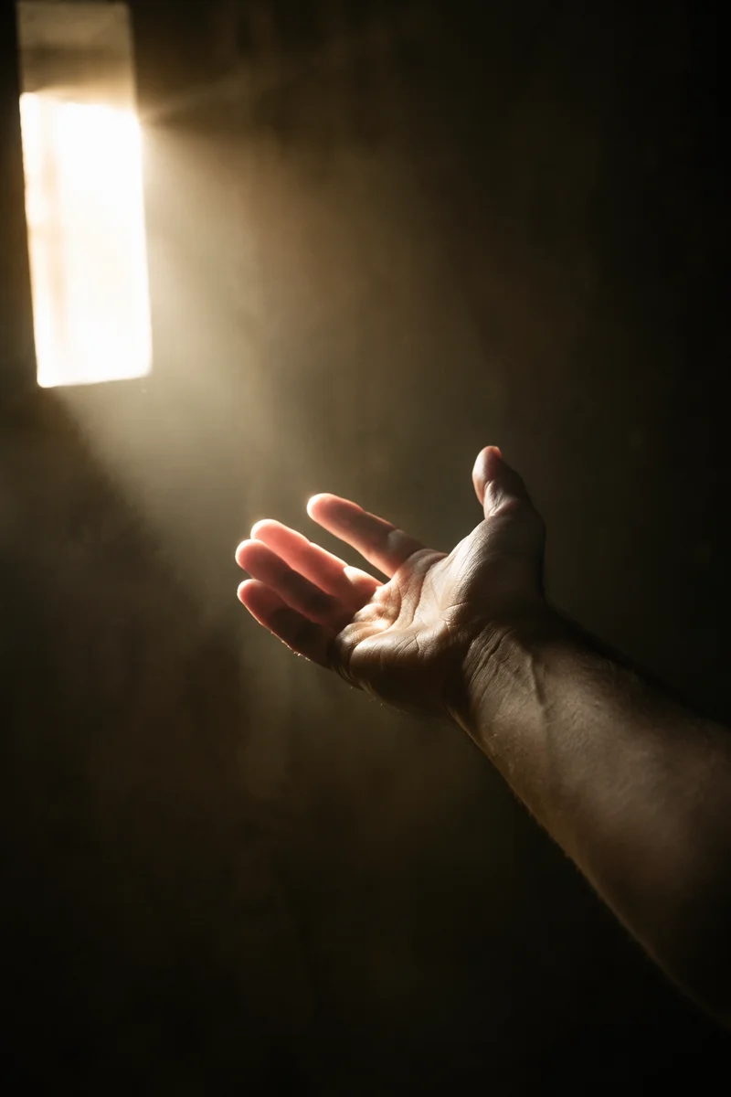 Open Hand Releasing Into Forgiving Light