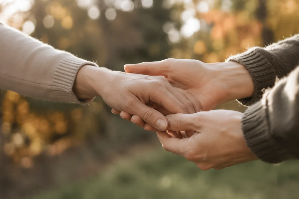 Forgiving Hands Letting Go in Warm Light