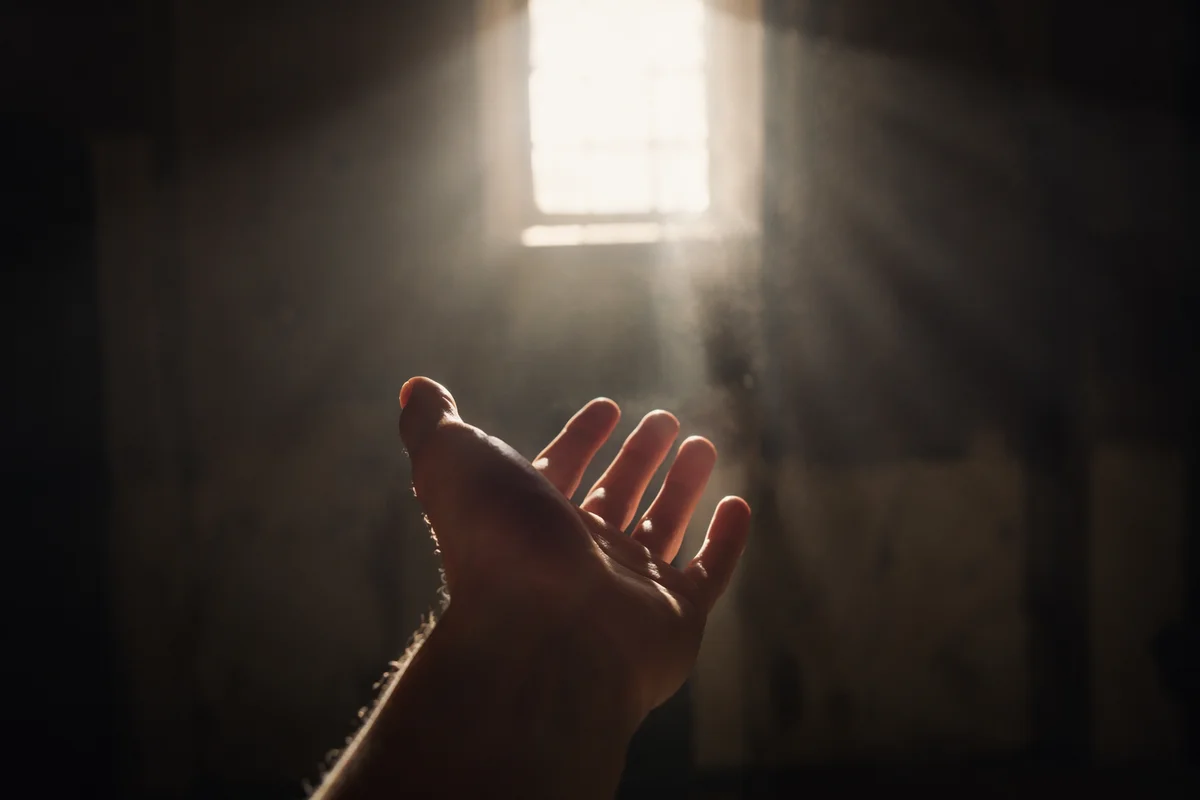 Open Hand Letting Go Toward Light