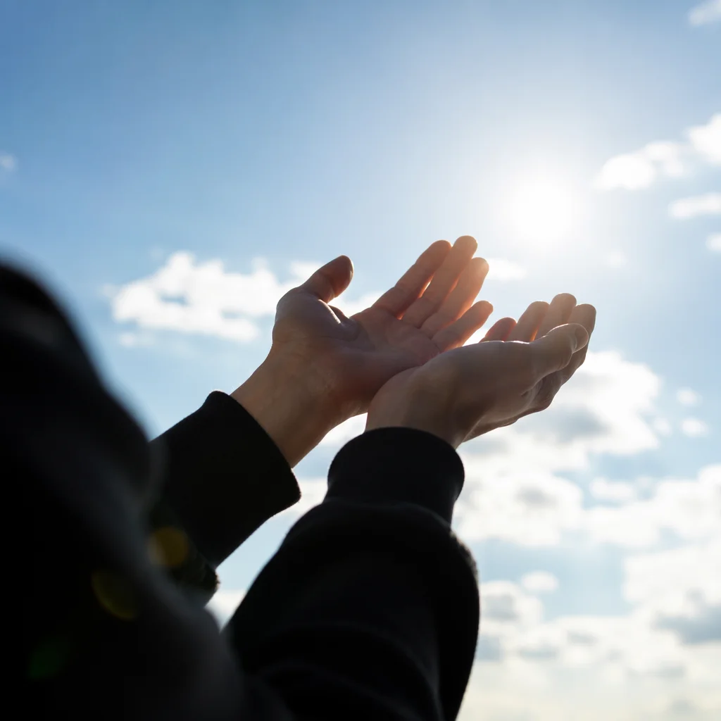 Open Hands Receiving Sunlight in Gratitude
