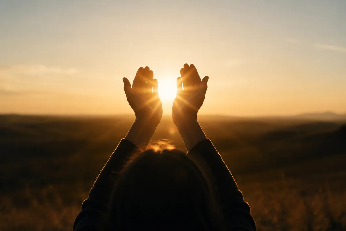 Open Hands Receiving Golden Sunlight in Gratitude