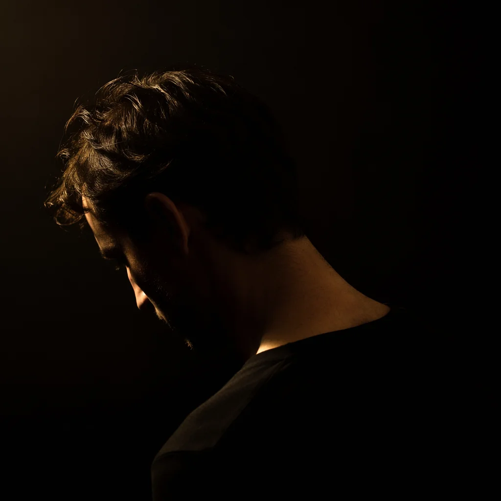 Humble Bowed Head in Gentle Light