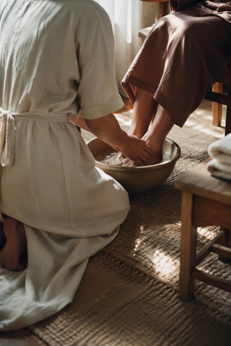Humble Foot Washing in Morning Light