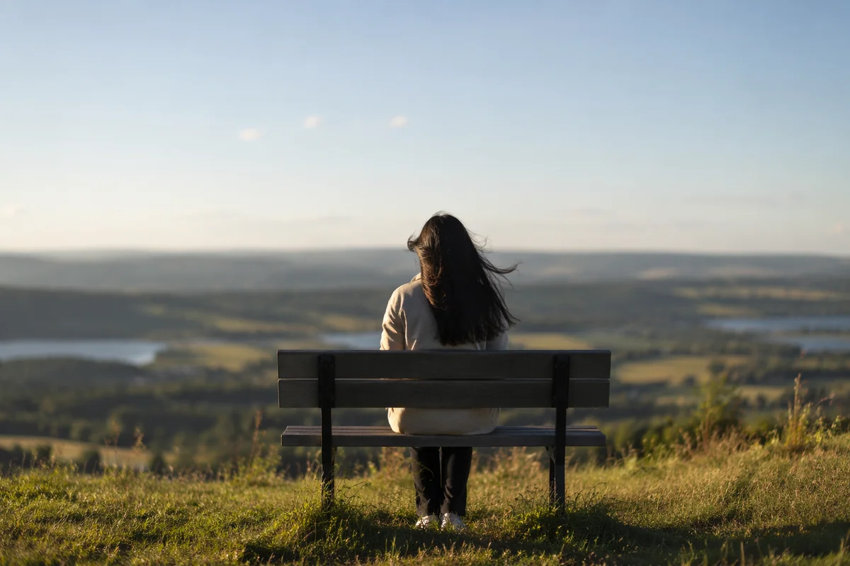 Longing Figure Gazing Toward Distant Horizon