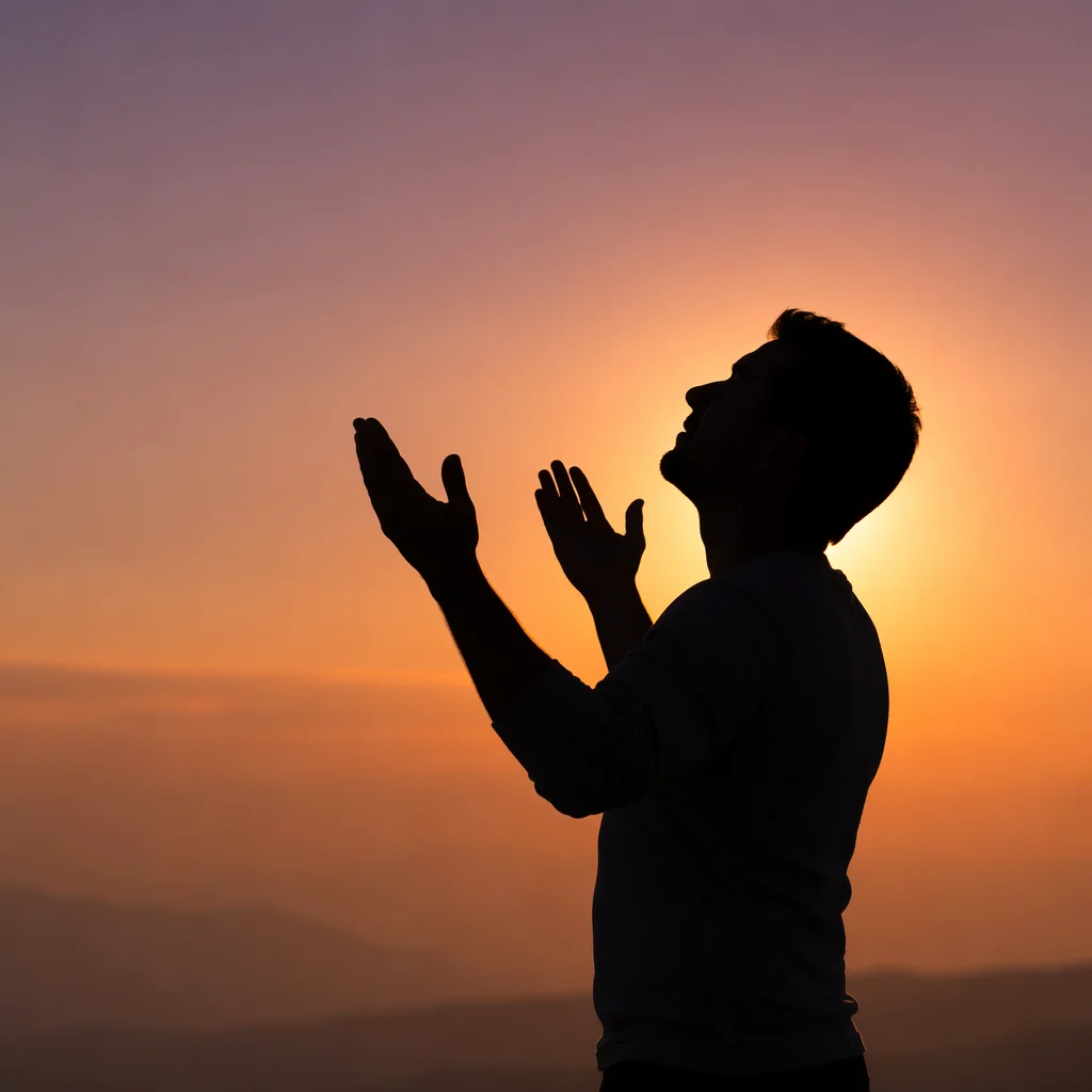 Praise Hands Raised at Golden Sunset