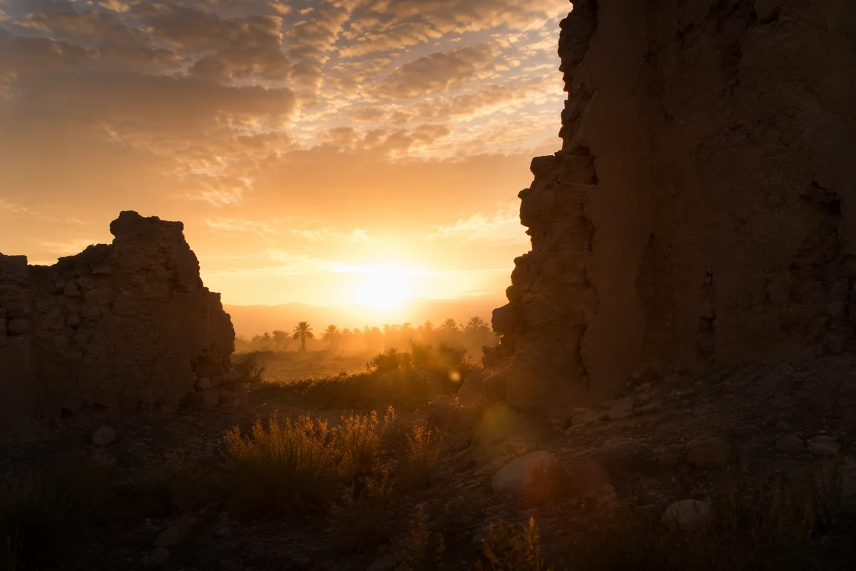 Redemption Sunrise Beyond Broken Desert Wall
