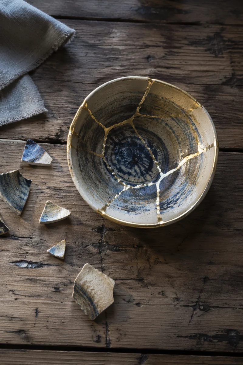 Golden Restoration of Broken Ceramic Bowl