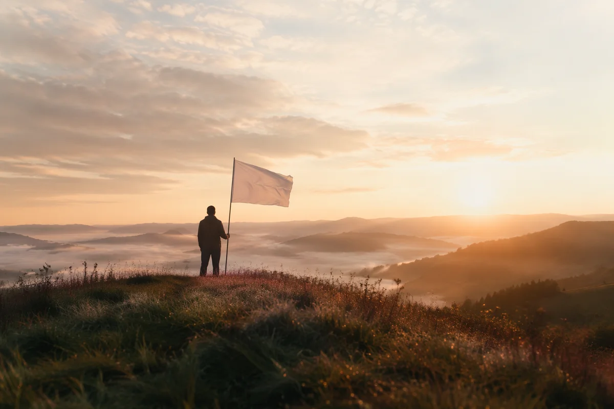 Quiet Surrender with White Flag at Sunrise