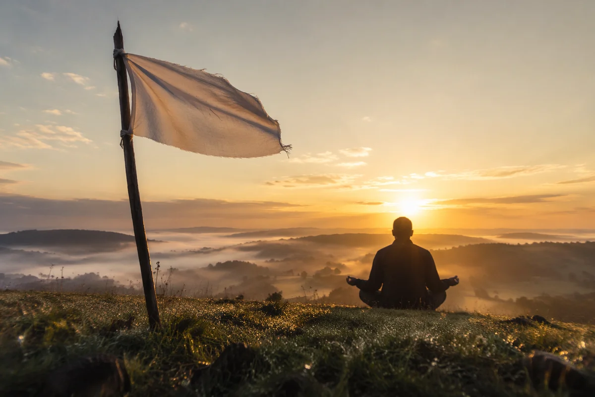 White Surrender Flag at Hopeful Sunrise