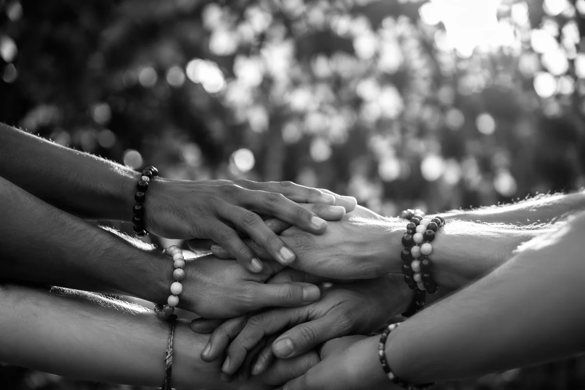 Diverse Hands Stacked in Hopeful Unity