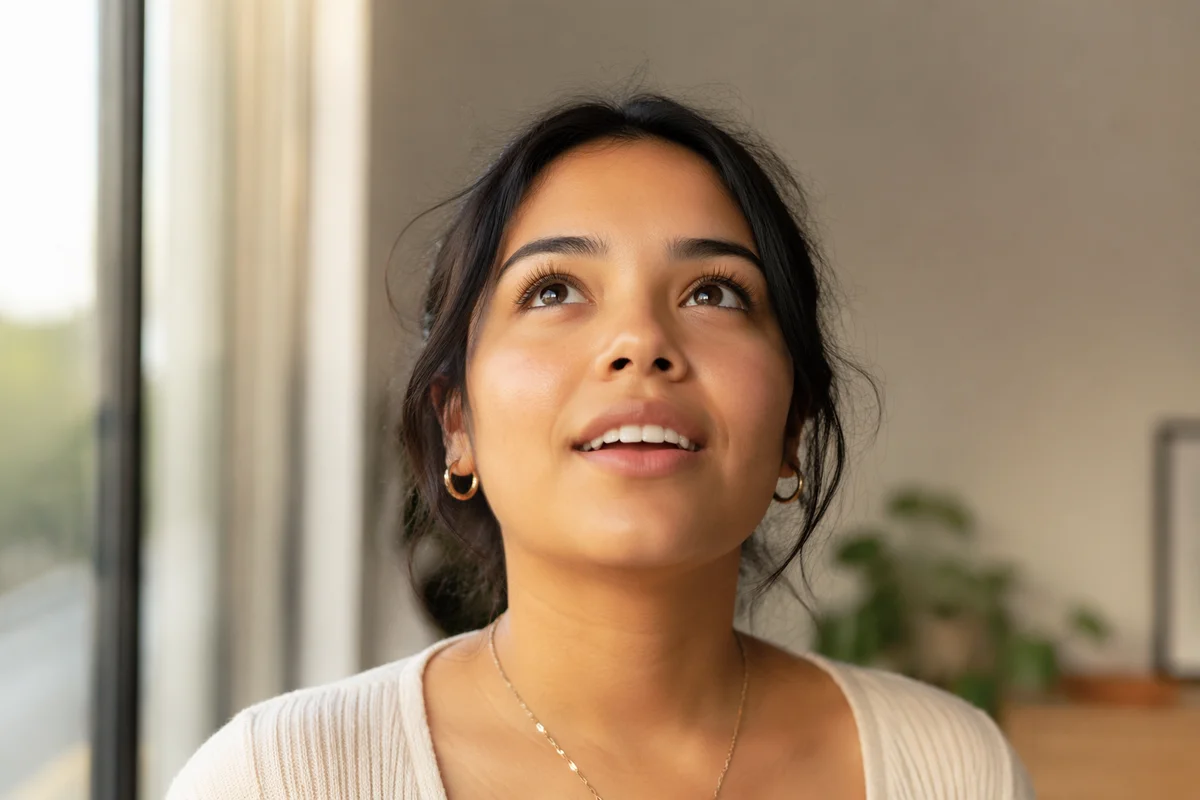 Awestruck Young Woman Looking Up Close-Up