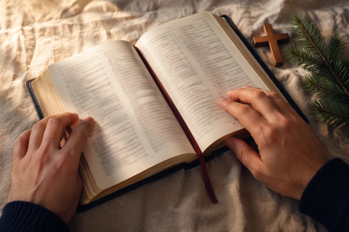 Open Bible With Wooden Cross on Linen